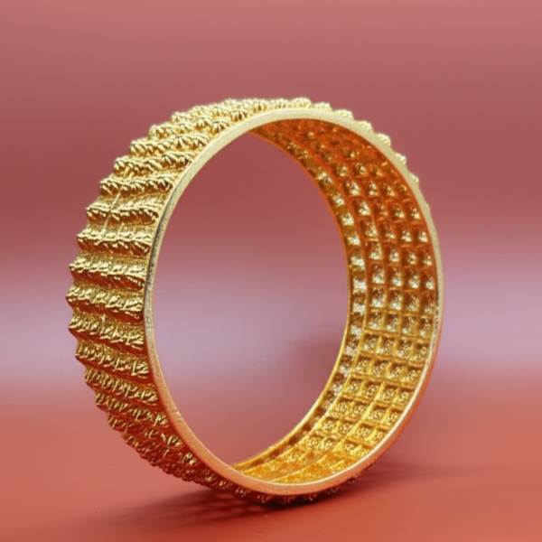 Traditional gold bangles worn on hand for wedding